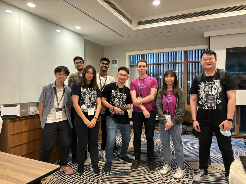 A group photo with the speakers of the car hacking workshop